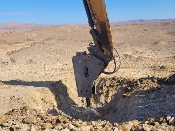 excavator  with breaker attachment