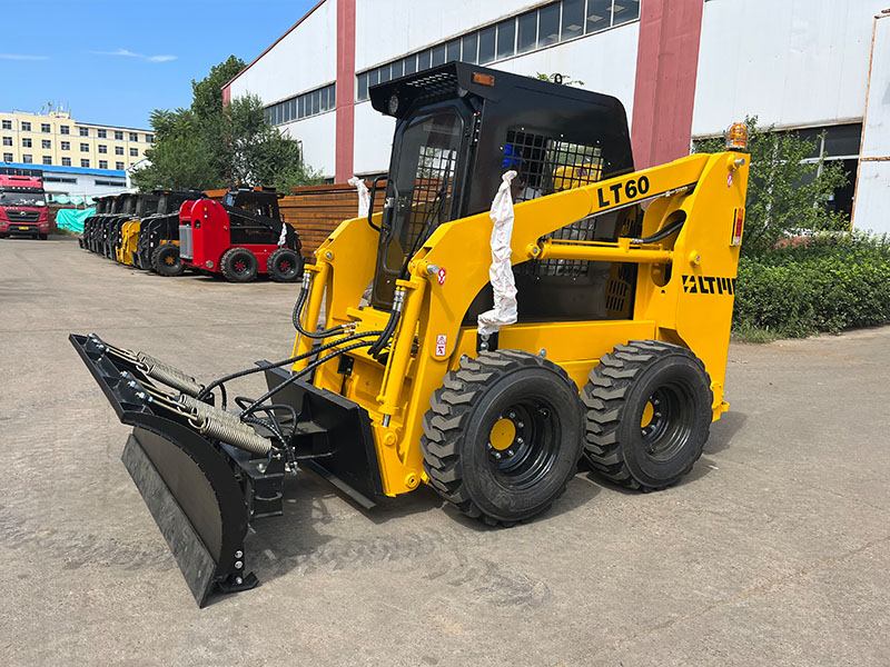 skid steer loader with snow blade